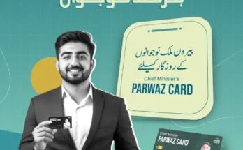 Pakistani young man holding the Chief Minister’s Parwaz Card for overseas employment under Punjab government initiative.